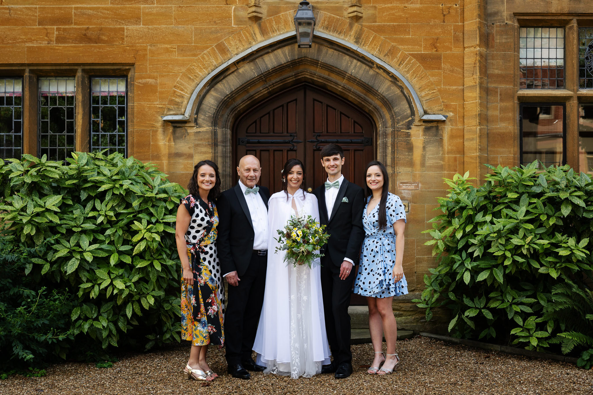 Family gathered for a group photograph at Trinity Hall, Cambridge